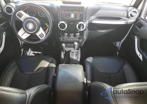 2015 Jeep Wrangler Unlimited Sahara from USA, damaged, VIN 1C4BJWEG6FL614671